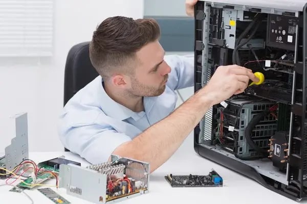 depositphotos_24098897-stock-photo-hardware-professional-examining-cpu-with